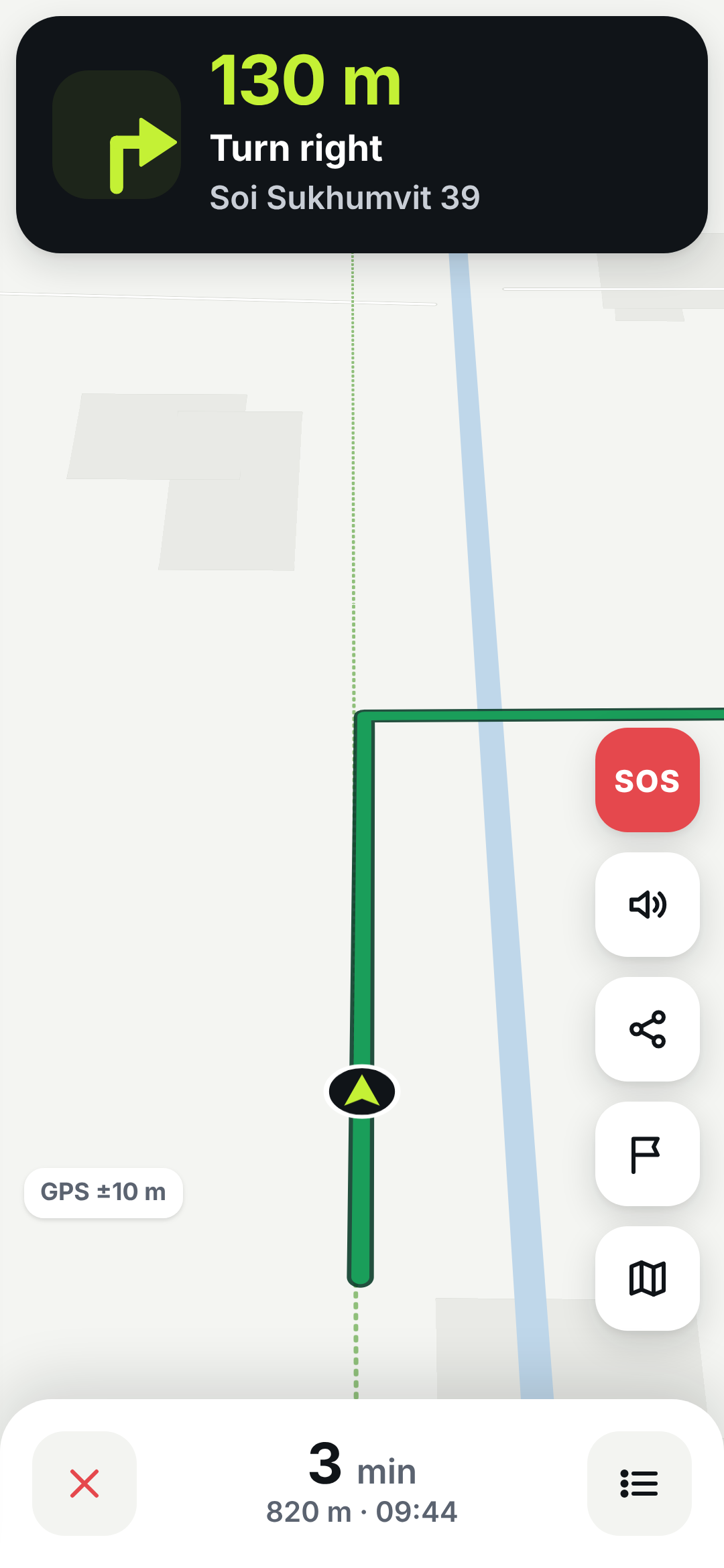 Turn-by-turn navigation screen with a large turn arrow and distance